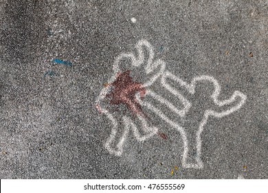 Crime Scene Chalk Line Tracing Of A Man Kicking Another Man To Death On A Asphalt Street, For The Concept: Street Violence.