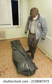 Crime Scene Investigation - Dead Man Placed In Body Bag