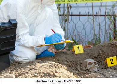 Crime Scene Investigation. Forensic Science Specialist Working On Human Remains Identification.