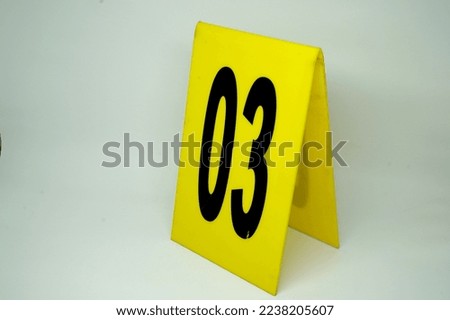  the crime scene number is yellow with serial number three                               Foto stock © 