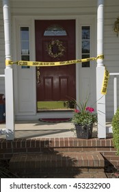 Crime Scene Tape At Front Door