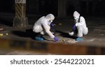 Crime scene, team or forensics at night with swab, evidence or DNA sample clue in abandoned warehouse. CSI people, hazmat suit or investigation in spotlight for legal service, inspection or pathology