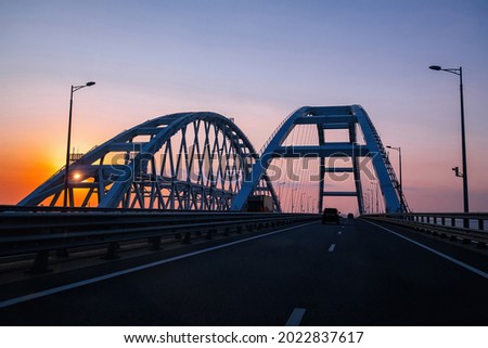 Crimea bridge over Kerch Strait at the evening sunset.