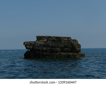 Crimea, Olenevka- May 2014: Cape Tarkhankut with beautiful rocks on the background of the sea and sky