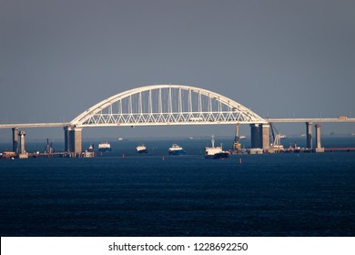 Crimean Bridge Road Across Kerch Strait With Leading Cargo Ships. Sea Gate To The  Azov Sea