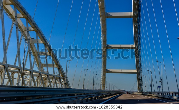 Crimean
bridge, Taman, Russia - 11,09,2020: The navigable arch of the
Crimean bridge. Arch of the highway and railway section of the
Crimean bridge. Driving along the Crimean
bridge.