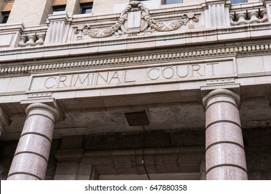 Criminal Court Sign On Front Facade Of Courthouse Building