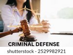 criminal defense, featuring a gavel, handcuffs, and legal documents on a desk. Ideal for content on criminal law, defense attorneys, and court proceedings.