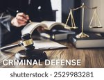 criminal defense, featuring a gavel, handcuffs, and legal documents on a desk. Ideal for content on criminal law, defense attorneys, and court proceedings.