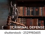 criminal defense, featuring a gavel, handcuffs, and legal documents on a desk. Ideal for content on criminal law, defense attorneys, and court proceedings.