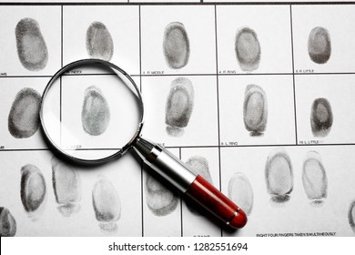 Criminal Fingerprint Card And Magnifier, Top View