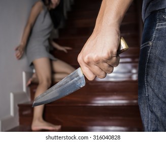 Criminal With Knife Attack Woman In A House,focus Hand