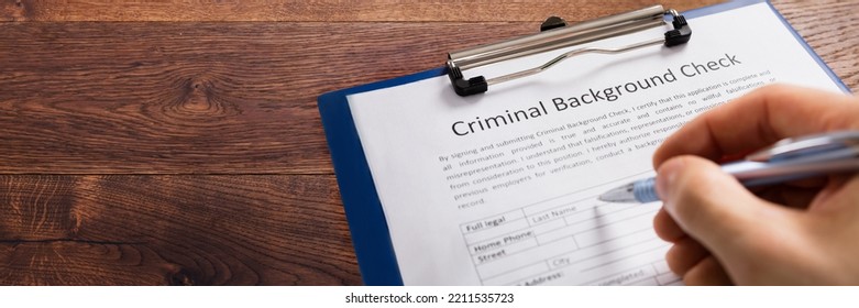 Criminal Record Check Form. Person Reading Report