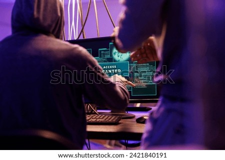 Criminals hacking computer network system successfully and getting access granted message on screen. Hackers breaking into server to steal valuable information while doing illegal activities