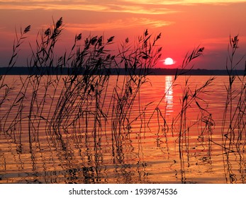 Crimson Sunset On The Lake