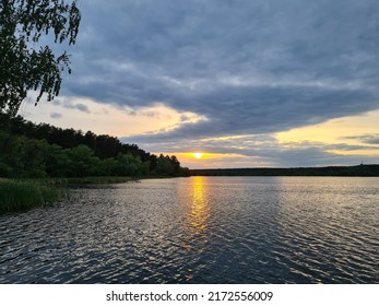 Crimson Sunset Over The Lake