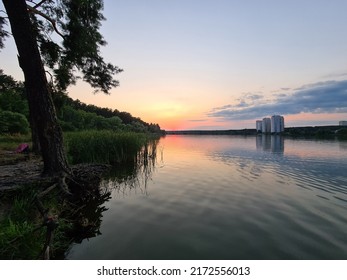 Crimson Sunset Over The Lake