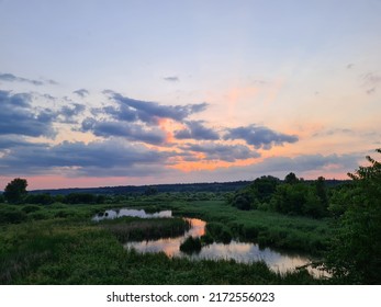 Crimson Sunset Over The Lake