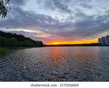 Crimson Sunset Over The Lake