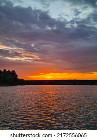 Crimson Sunset Over The Lake