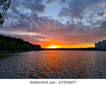 Crimson Sunset Over The Lake