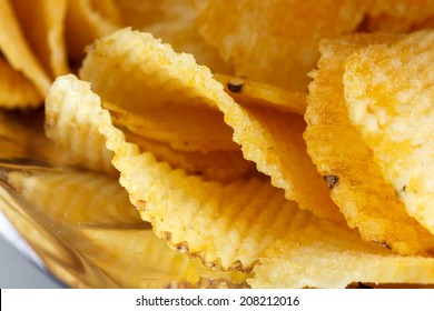 Crinkle Cut Crisps On White Background.