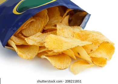 Crinkle Cut Crisps Spilling Out Of A Foil Packet.