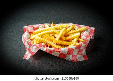 Crinkle Cut French Fries In A Basket