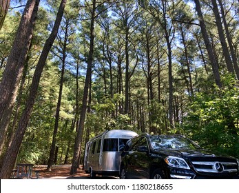 CRISFIELD, USA - SEPTEMBER 3, 2018: Am airstream travel trailer parked at Janes Island State Park, MD, USA.