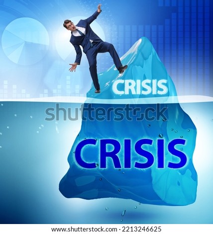 Crisis concept with businessman on iceberg