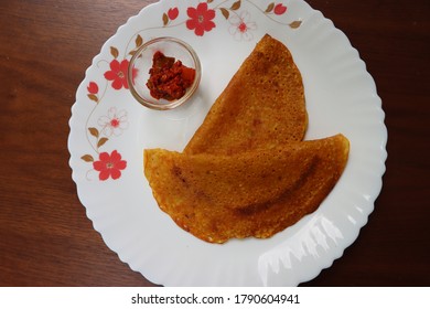 A Crisp, Golden Dosa Made Using A Batter Of Rice And Mixed Dals