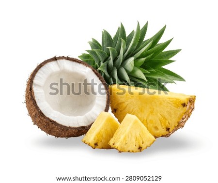 Crisp isolated composition of ripe pineapple slices and a cracked coconut half, perfect for natural juice and tropical wellness branding.