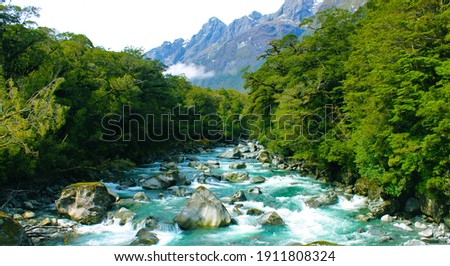 Crisp river flows in the moutain range