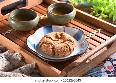 Crisp Walnut Cookie  On The Plate