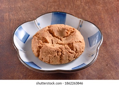 Crisp Walnut Cookie  On The Plate