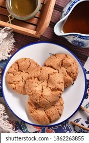 Crisp Walnut Cookie  On The Plate