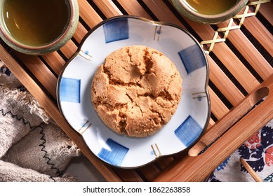 Crisp Walnut Cookie  On The Plate