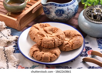 Crisp Walnut Cookie  On The Plate