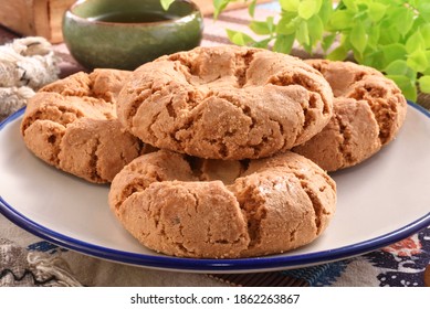 Crisp Walnut Cookie  On The Plate