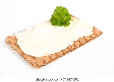 crispbread with cream cheese and white background