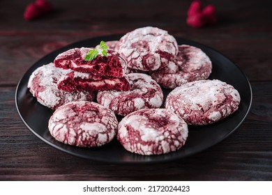 Crispy Biscuits On Black Plate. Cookies Red Velvet With Cream Filling. Half Of Broken Cookie And Whole Cookies Decorated Powdered Sugar, Holiday Baking Recipe, Colorful Food, Homamed Bakery