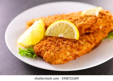 Crispy Breaded Fish Fillet And Lemon