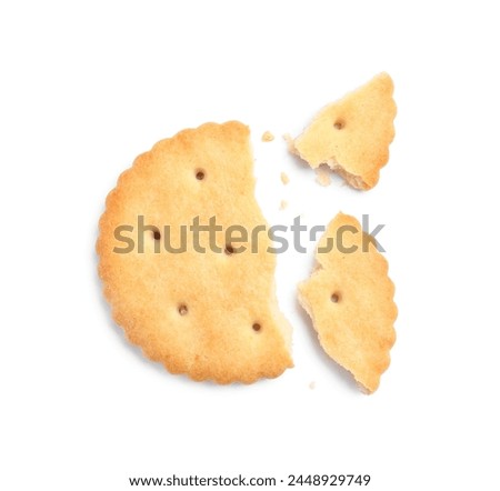 Crispy broken cracker isolated on white, top view