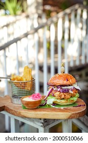 Crispy Chicken Burger With Cassava Fries And Aioli