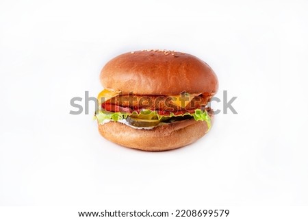 crispy chicken deluxe burger on a white background