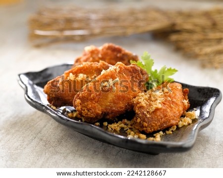 Crispy Chicken Mid Joint wings with Prawn Paste served dish isolated on background top view food