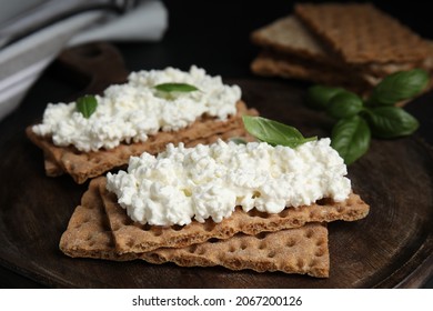 Crispy Crackers With Cottage Cheese And Basil On Board, Closeup