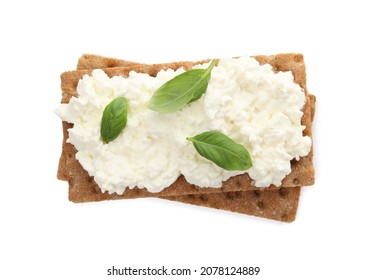 Crispy Crackers With Cottage Cheese And Basil On White Background, Top View