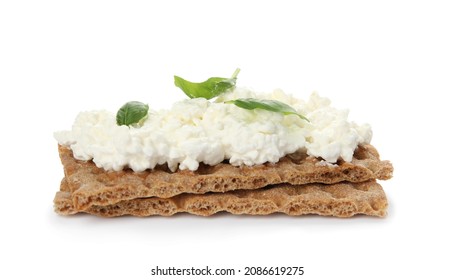 Crispy Crackers With Cottage Cheese And Basil On White Background