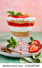 Crispy Creamy Strawberry Trifle In A Glass . Delicious Summer Dessert Of Shortbread Crumbs, Yogurt Quark Cream And Strawberries. Selective Focus